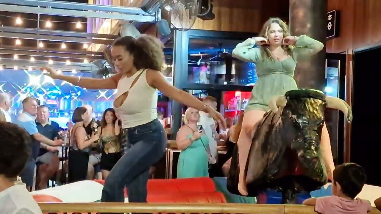 Riding a bull on Benidorm's Mechanical Bull