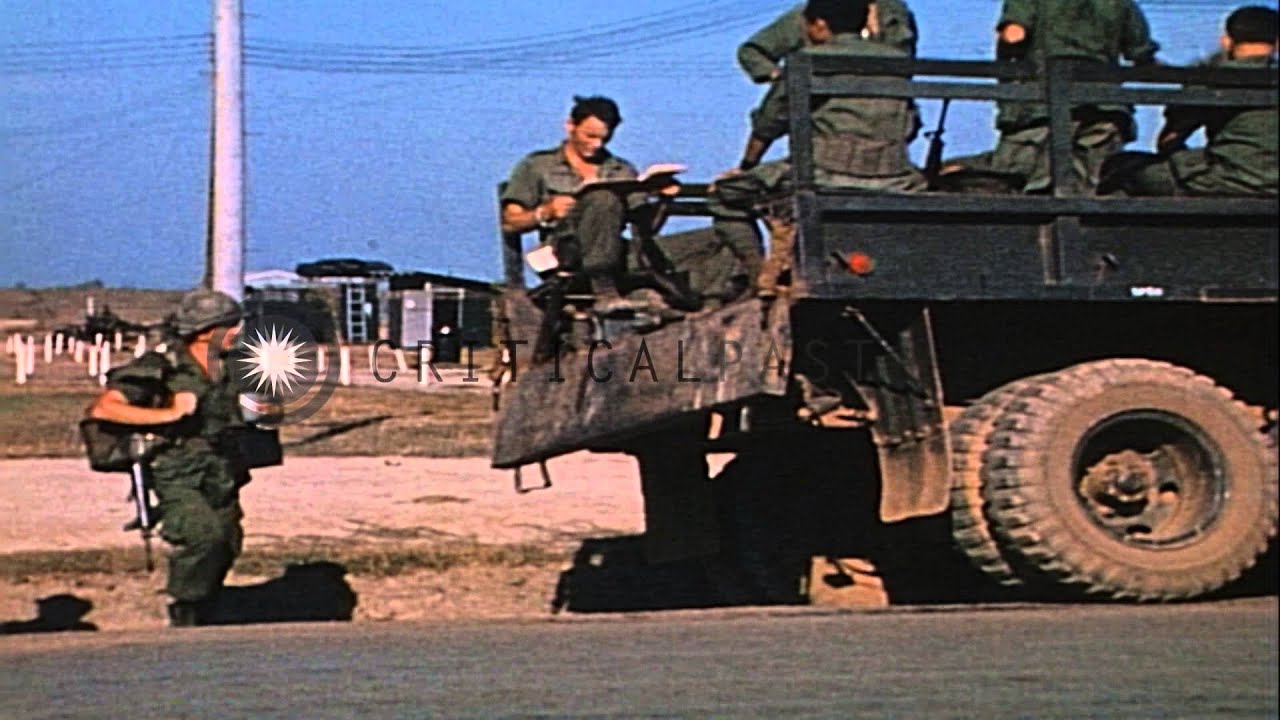 Movement of military truck convoy during Vietnam war HD Stock Footage