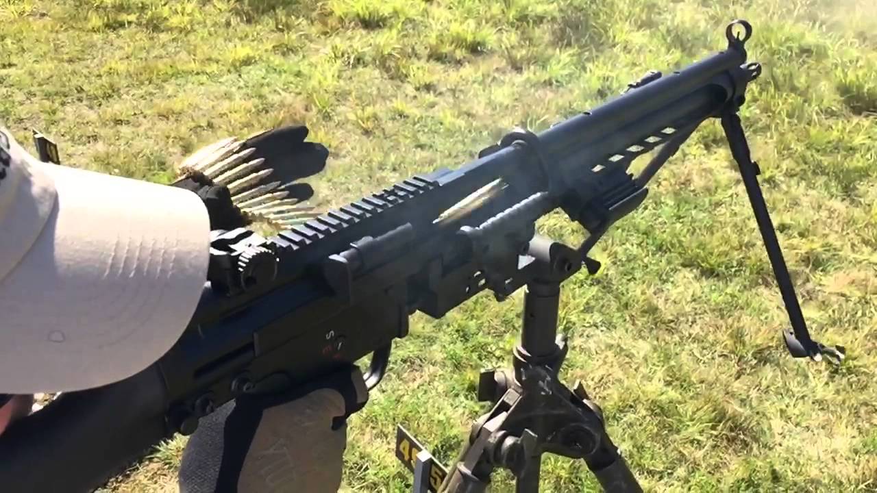(H&K) MM23e Beltfed Machine Gun - 100 rounds slow motion