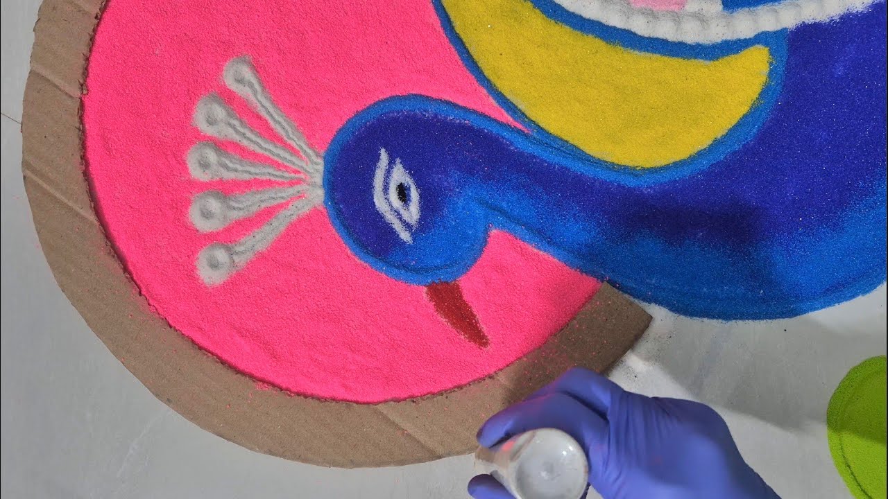 Beautiful Peacock Rangoli || Rangoli design || Peacock design || Sand art || New Year rangoli art 