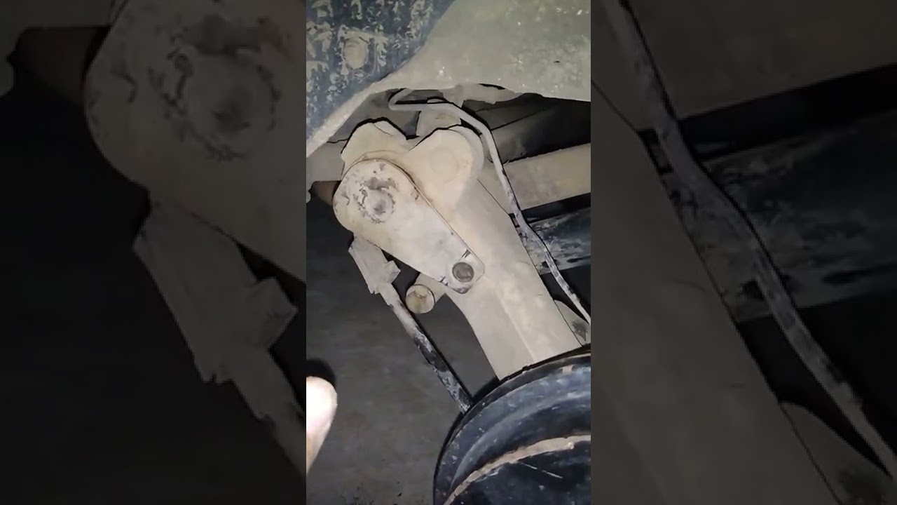 Como trocar o amortecedor traseiro do Peugeot 207  (parte 2)