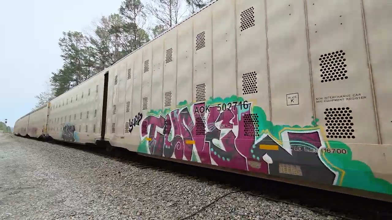 NS 4954 & 4434 approach CP Long with the northbound graffiti train 