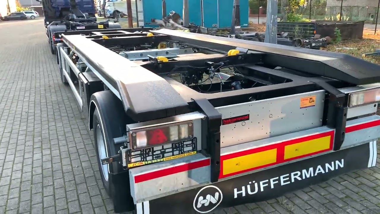 MAN 26.460 Hakowiec zestaw z nową przyczepą Hueffermann.