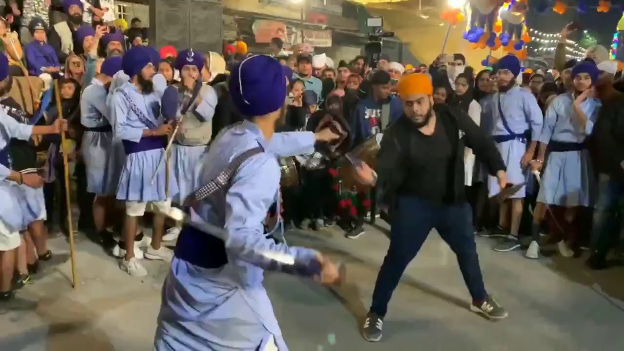 Nihang sikh playing gatka at farmer protest in Delhi