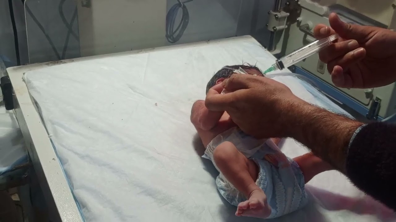 Cute baby  giving antibiotics 