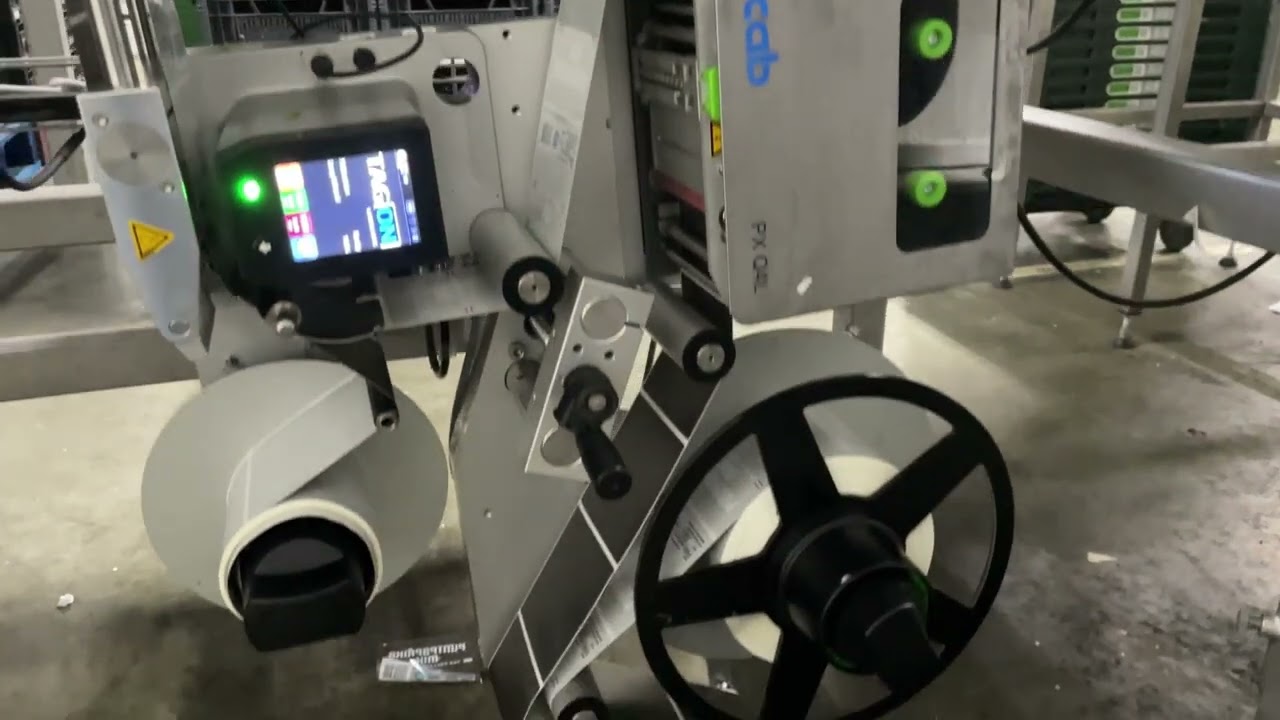 Tegra Checkweger met IXOR label dispenser