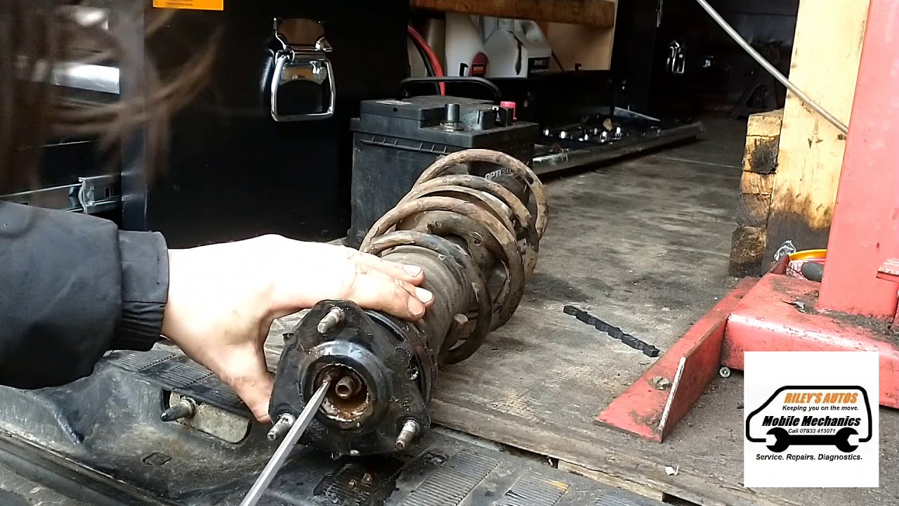Ford Fiesta Snapped Front Suspension Coil Spring Fitting Shock Absorber McPherson Strut Replacement