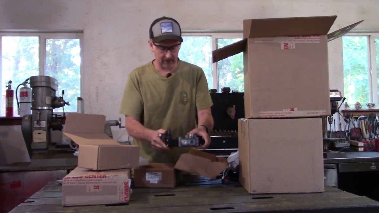 Unboxing hydraulics and motor for the electric 360 degree backhoe and talking about them.