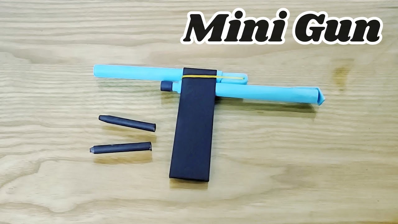 HOW TO MAKE A MINI GUN THAT SHOOTS PAPER BULLETS