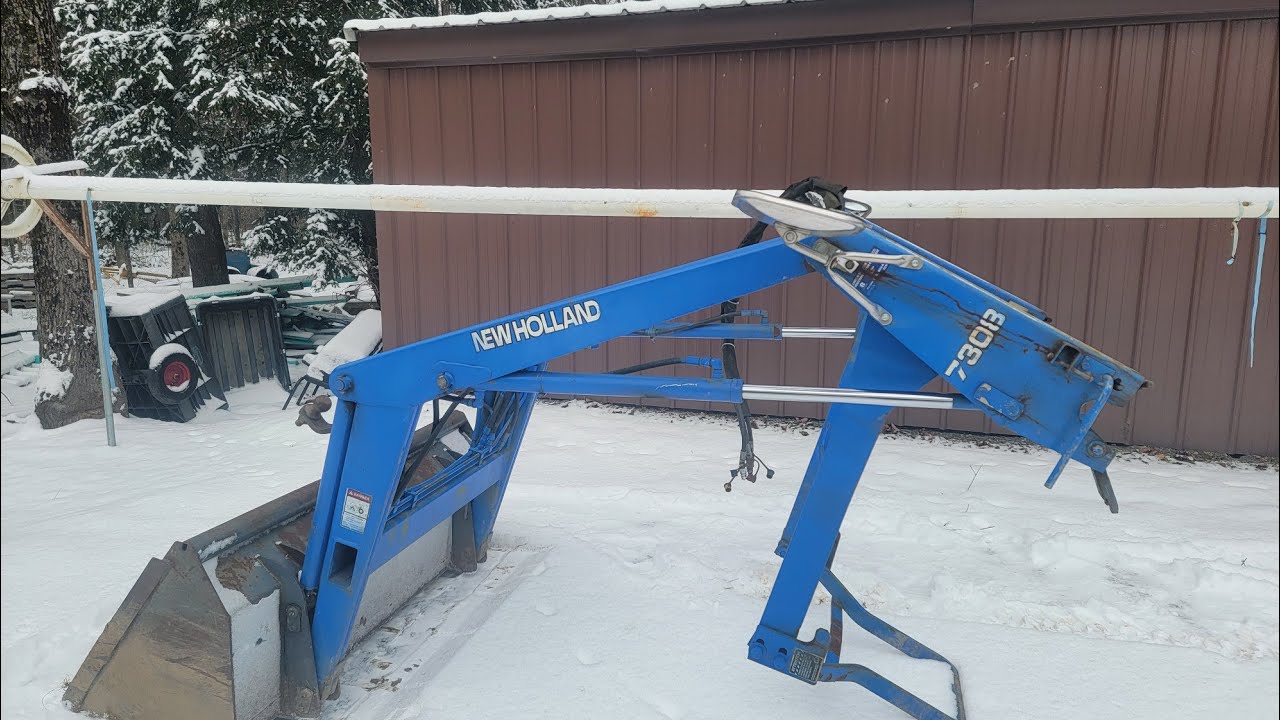 Снятие погрузчика New Holland