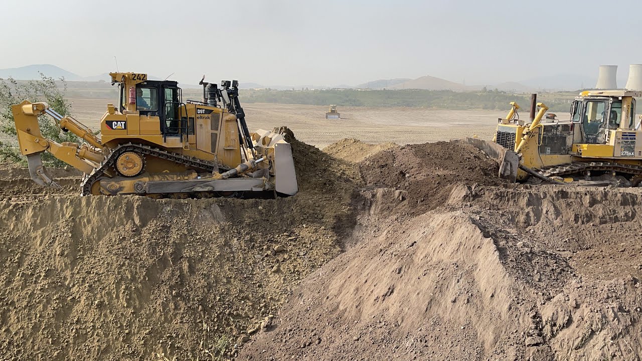 Caterpillar D9T And Komatsu D275AX Bulldozers Amazing Team Pushing Soil On Huge Mining Area