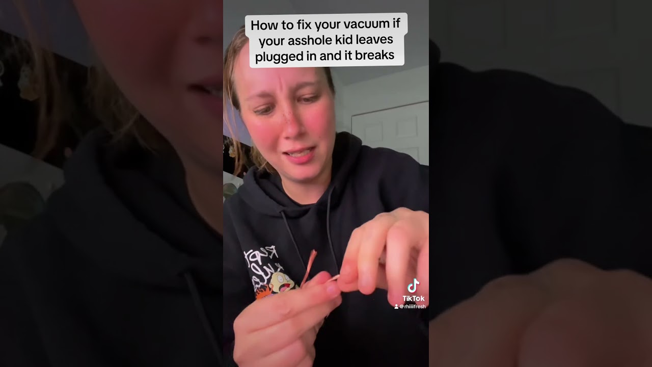 ￼Just a girl fixing her vacuum cord 