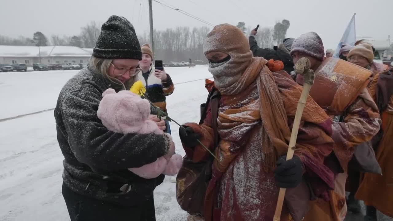 Thousands wait hours to see Buddhist monks' peace walk through Petersburg: 'You can see the love'