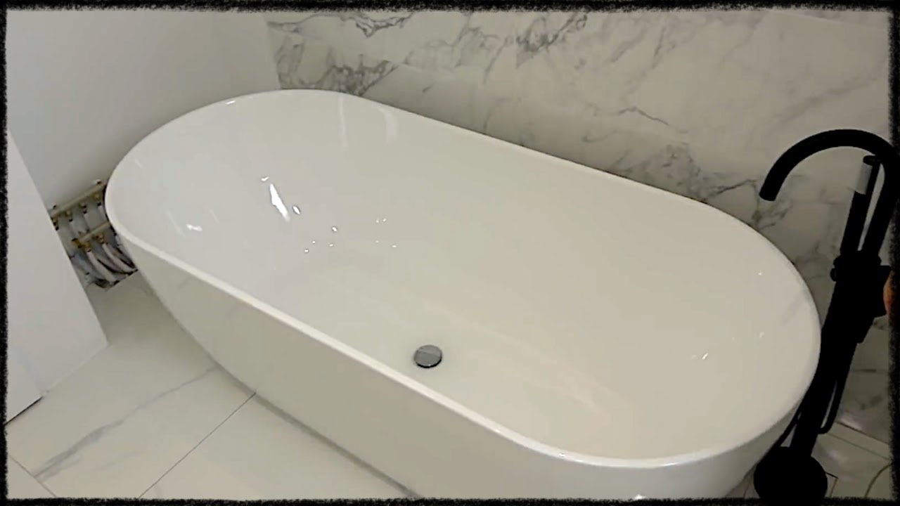 Pose d'une baignoire îlot ( best of )