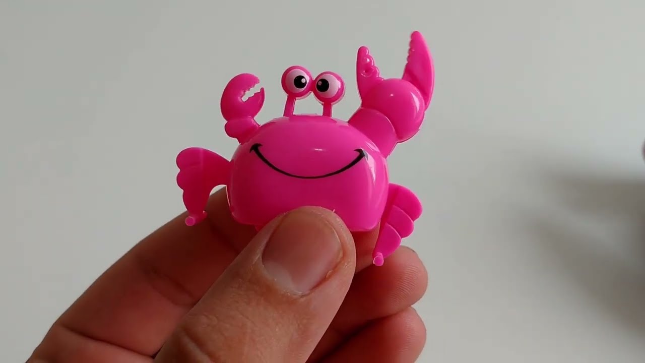 Mini caranguejo de brinquedo movido a corda