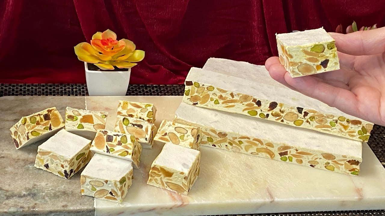 Torrone Italian nougat with nuts and dried fruits نوكة رائعة بالمكسرات والفواكة المجففة