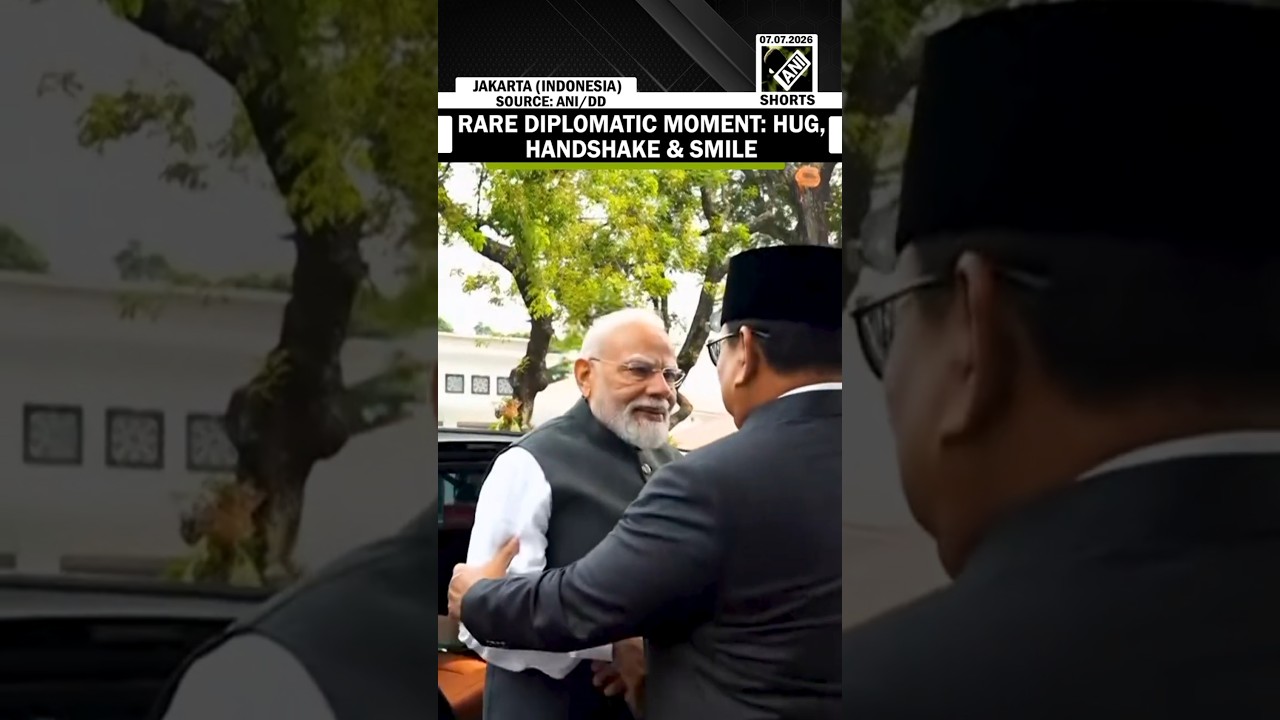RARE DIPLOMATIC MOMENT: PM Modi, Indonesian President share hug, handshake & smile