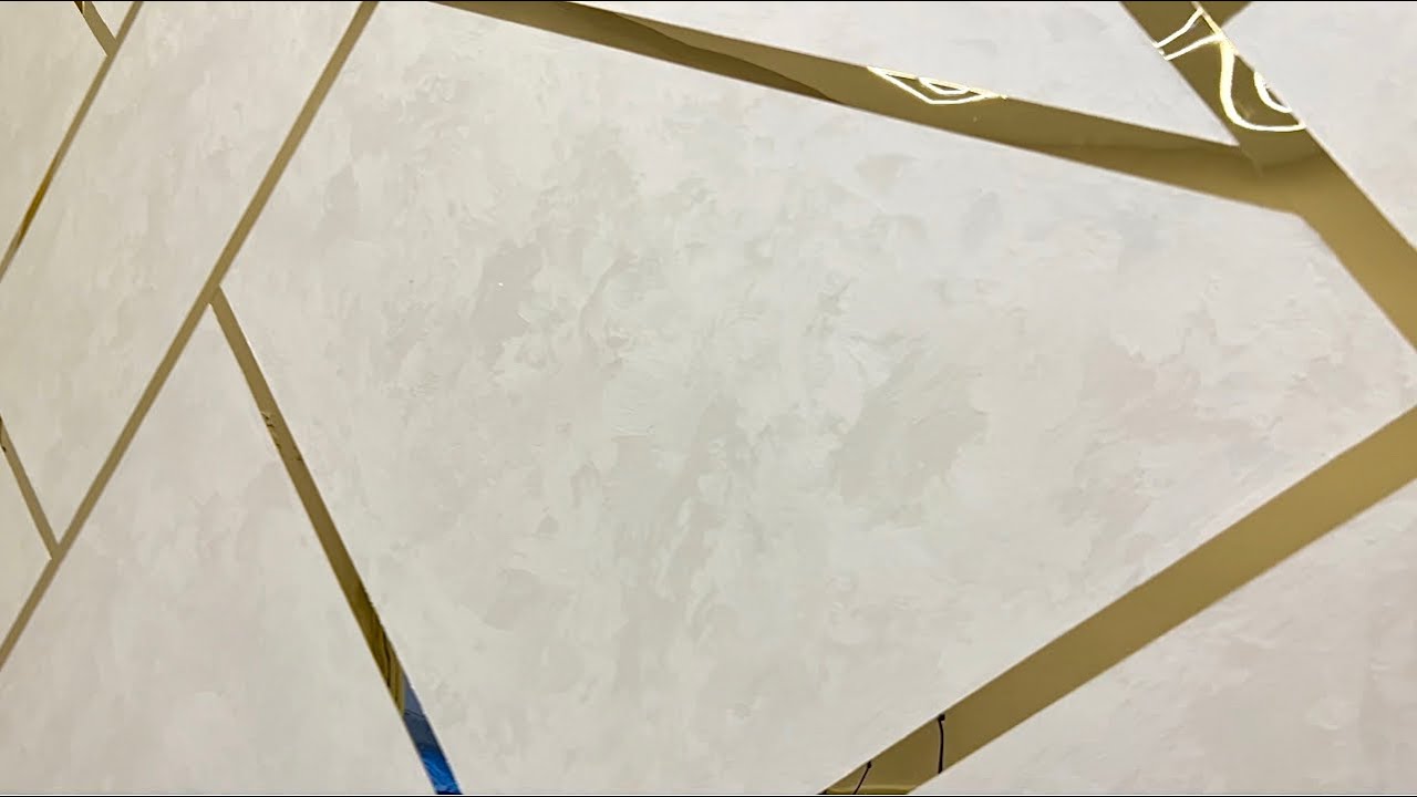 Professional Installation of Gold Stainless Steel Strips with Velvet Paint Finish