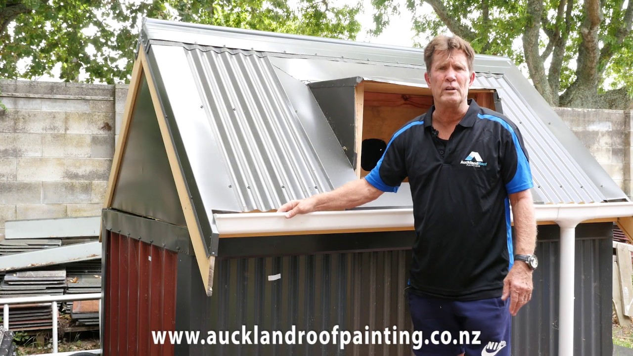 How does Auckland Roof Painting paint an Iron Roof?