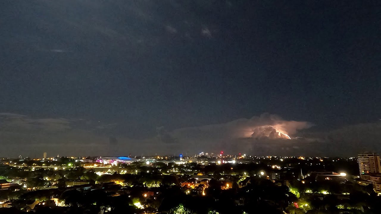Rising Moon with Lightning