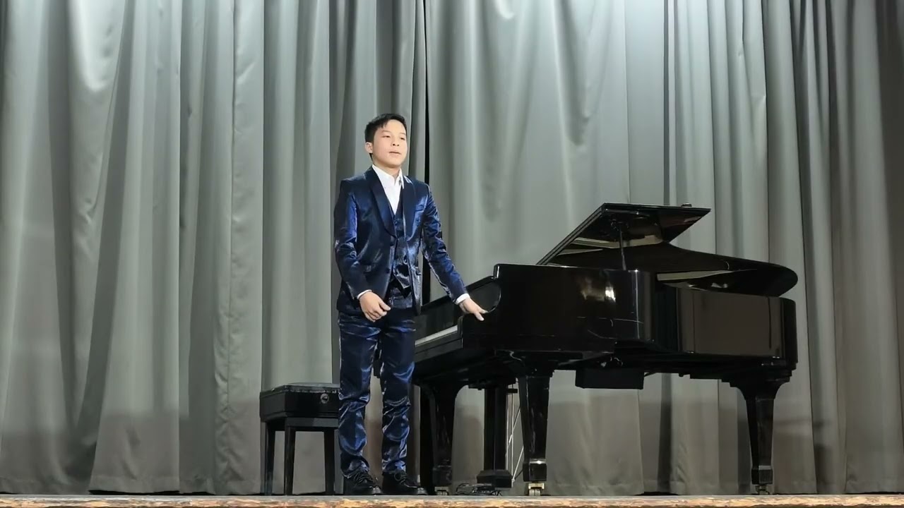 Aiden performs piano and violin as a Prelude performer in Music for Flute Oboe and Strings concert
