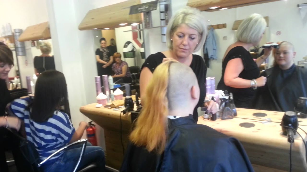 Kristy getting her head shaved to support mam after chemo