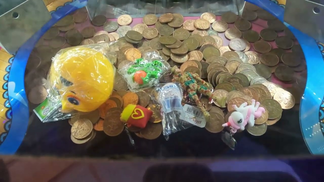 2p Roller Coaster coin pusher - £3.00. A little win