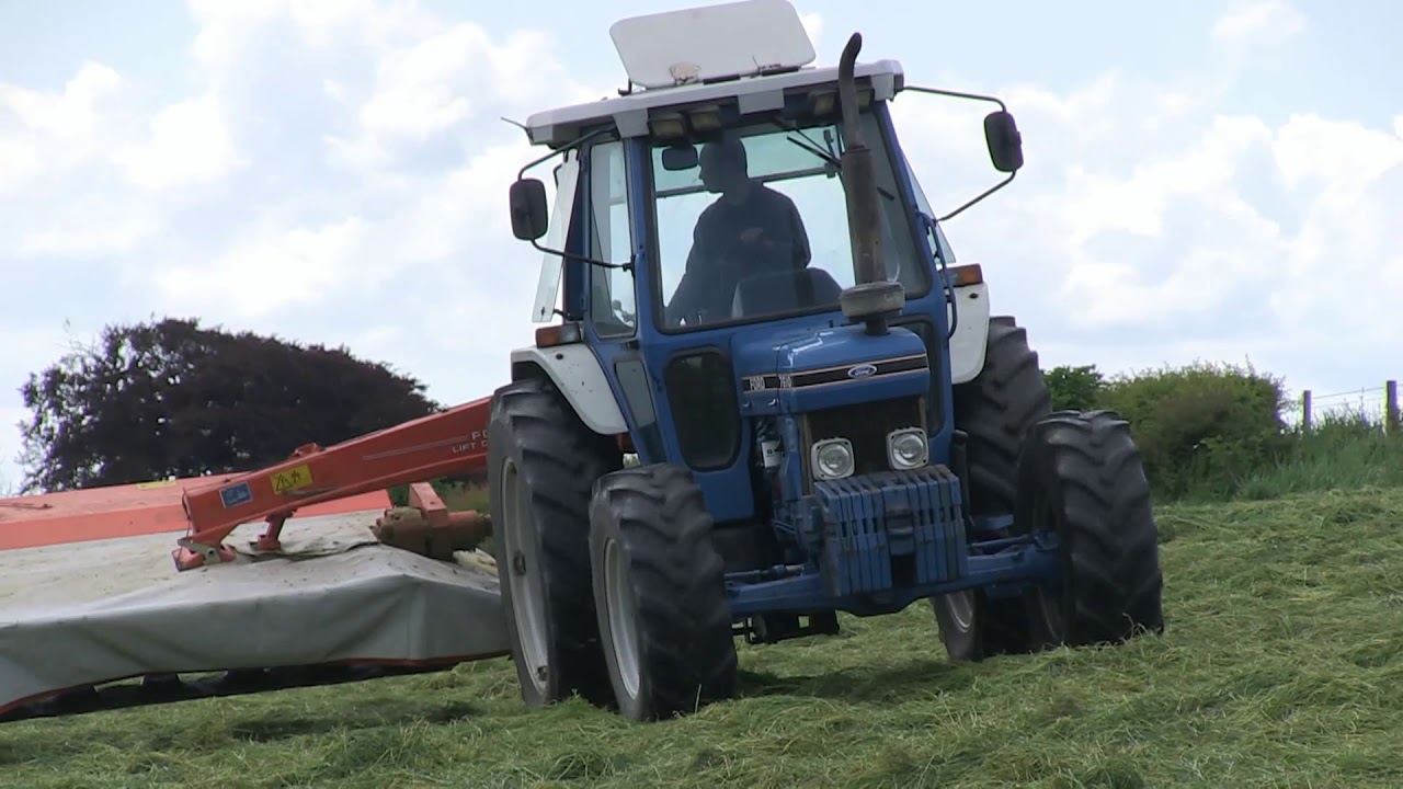 FORD 7610 II AND KUHN FC243 MOWER
