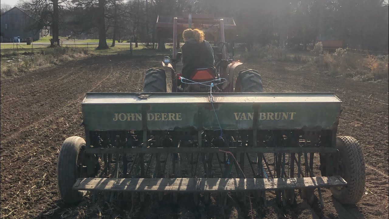 John Deere van brunt grain drill.  Fall seeding our garden w/crazy rays & cultipacking afterwards.