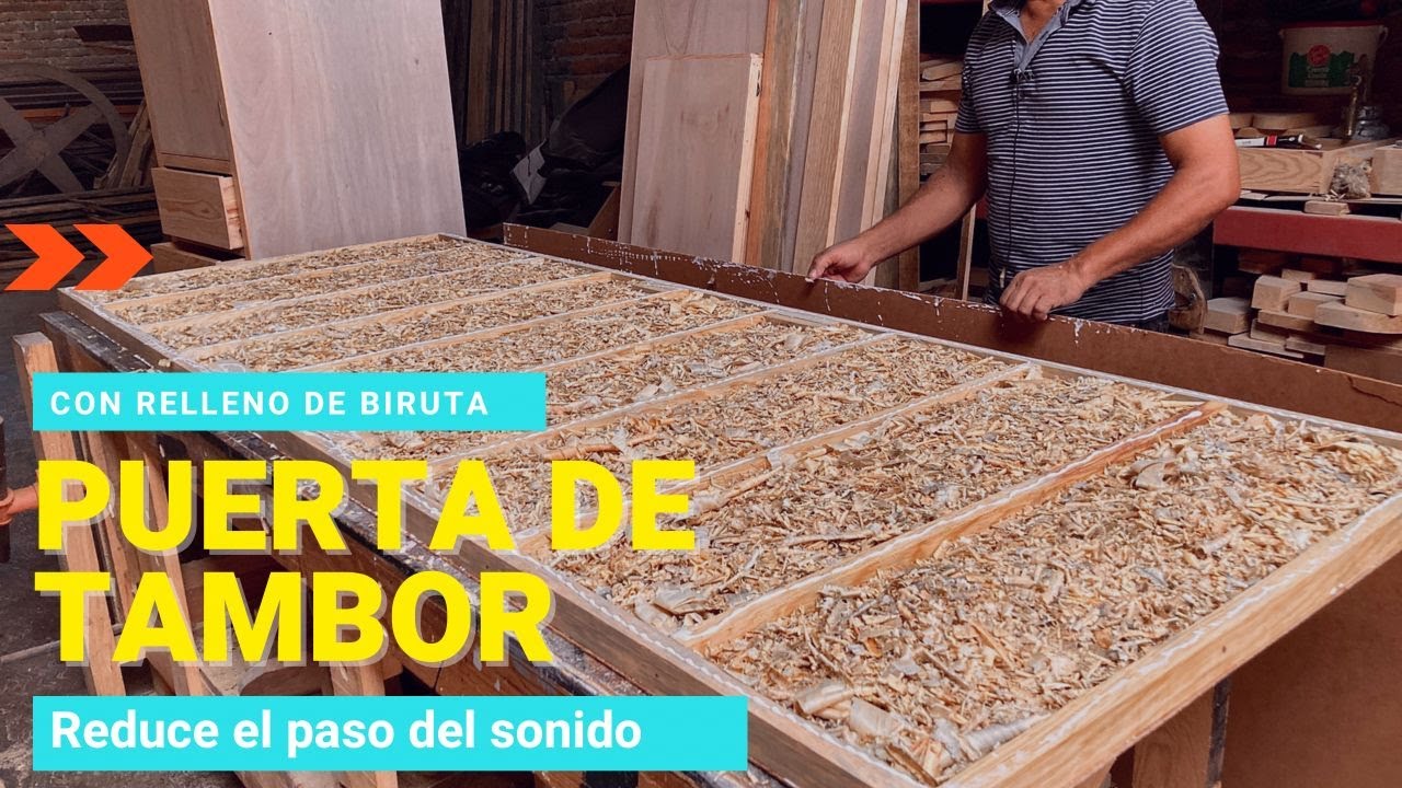 PUERTA DE TAMBOR QUE REDUCE EL PASO DEL SONIDO