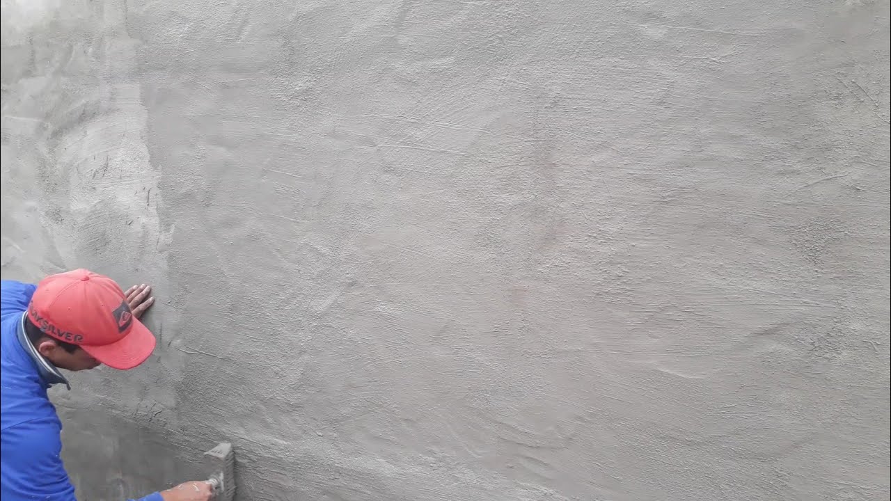 Muro de arrimo (parte 9) aplicando impermeabilizante .