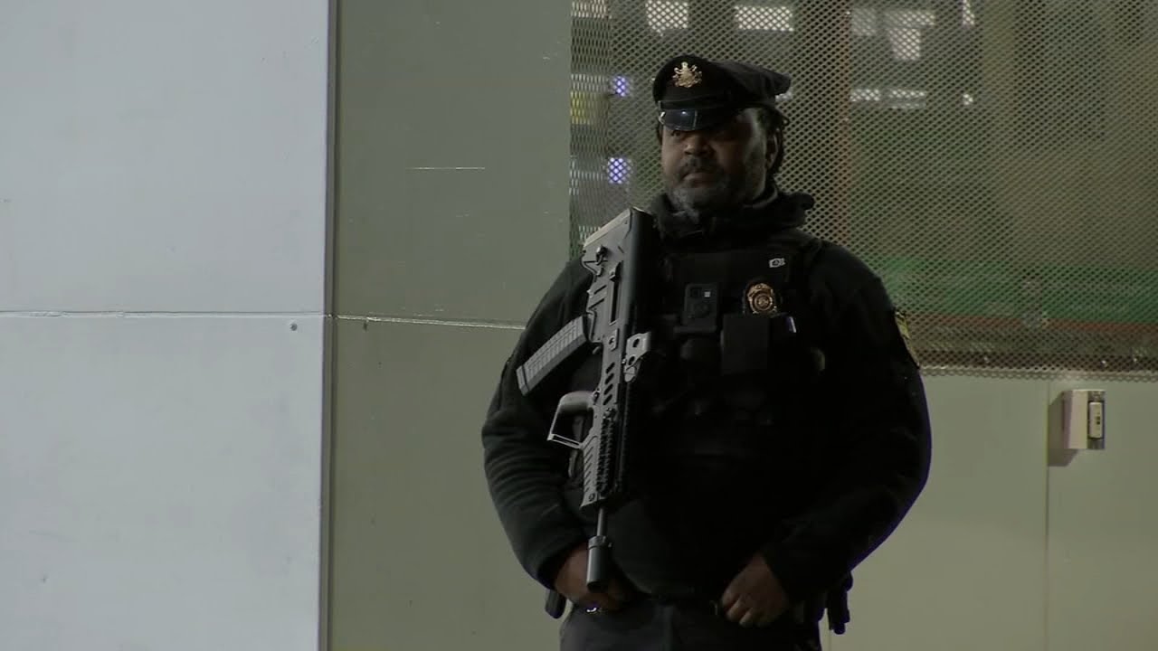 ARMED GUARDS: Gas station owner hires armed agents to patrol property