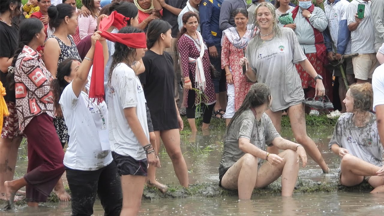 Foreigners enjoying planting in asar 15 pokhara ||असारे मेलामा बिदेशीको रमाइलो || ropai mela