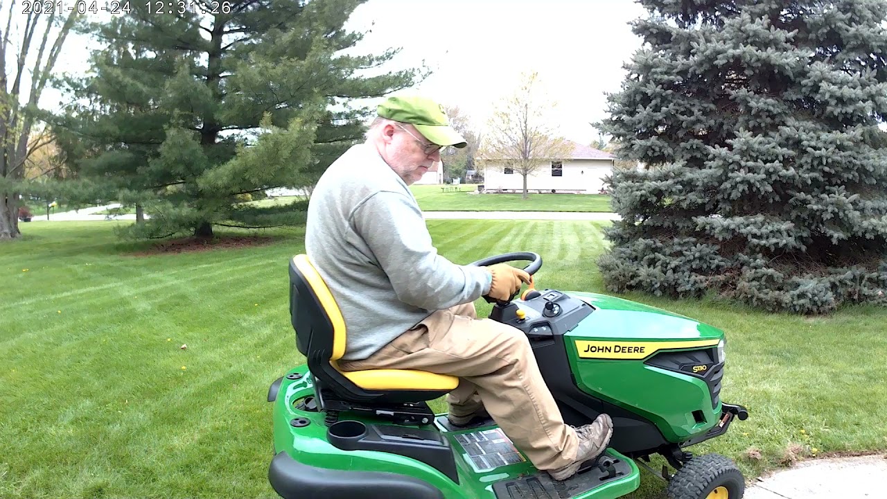 the john deere s130 mowing the grass 4/24/21