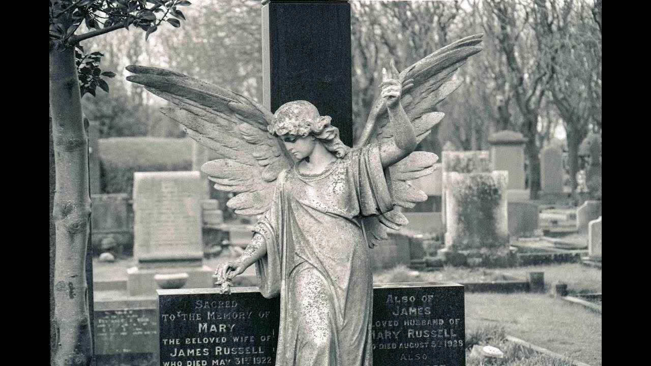 A long Canon Zoom and HP5 Plus pushed to 1600 because of gloomy light