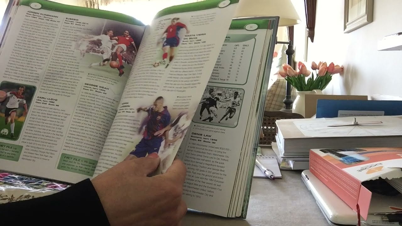 ASMR; Page flip, soccer book.  Soft spoken reading and commenting
