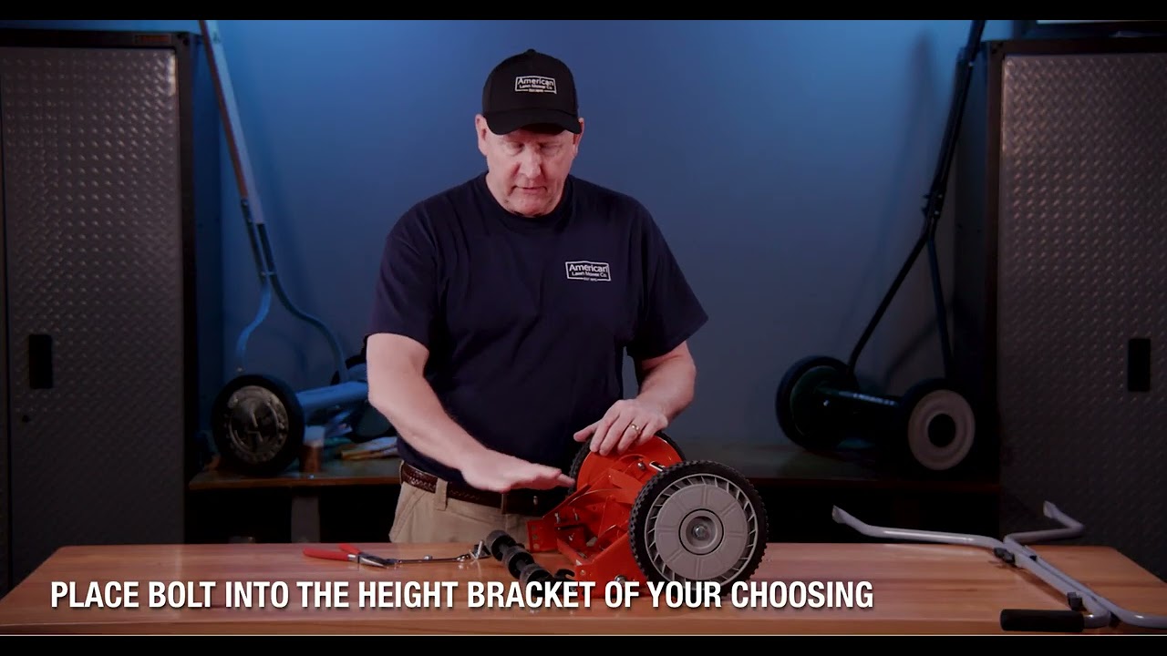 Reel Mower Height Adjustment With A Roller Bracket