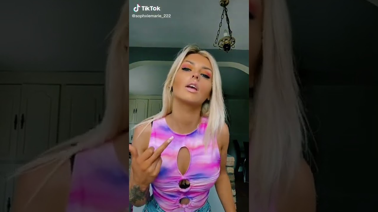 shows her big ti. ts