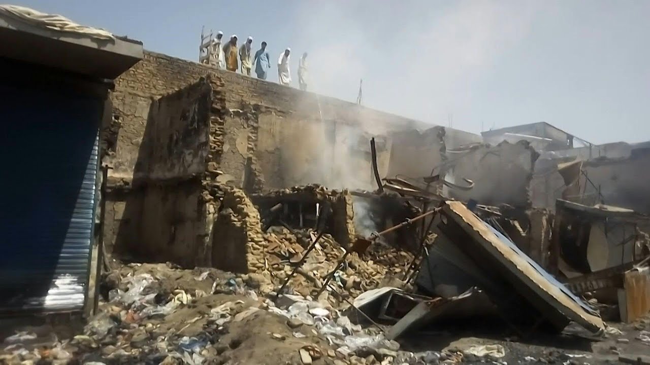 Burnt shops in the markets after Taliban seize Kunduz | AFP