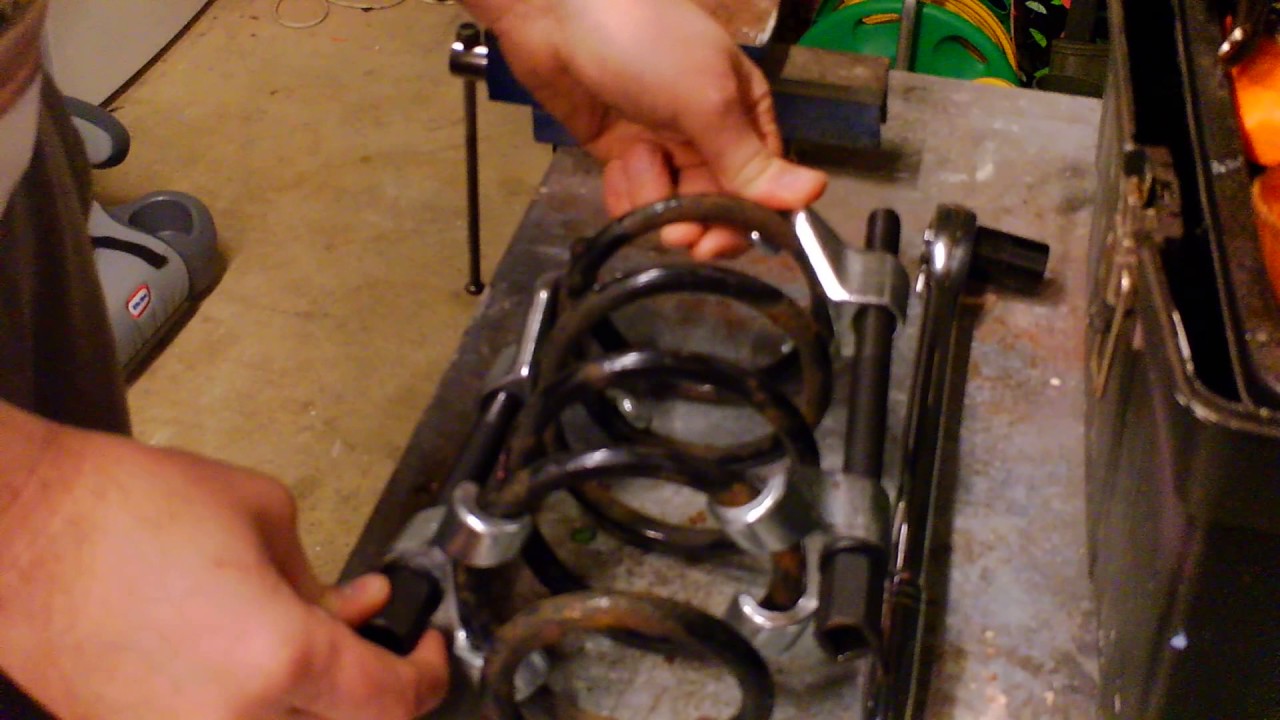 How to compress suspension coil springs safely