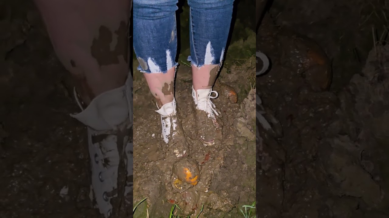 Girl destroying converse in mud