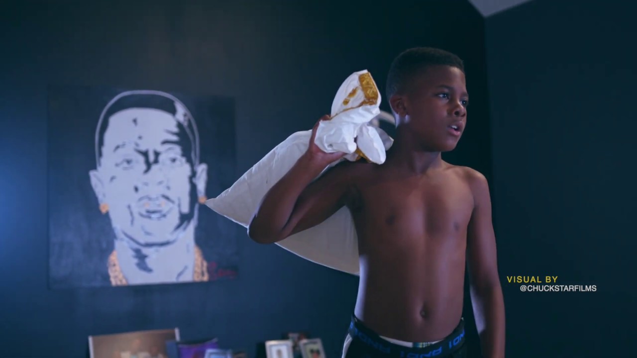 Boosie challenges his kids to a pillow fight