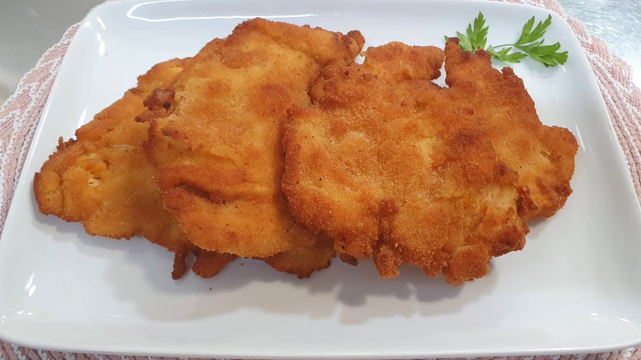 pollo rebozado con un adobo crujiente y muy sabroso,las clases del éxito. Sabor Artesano