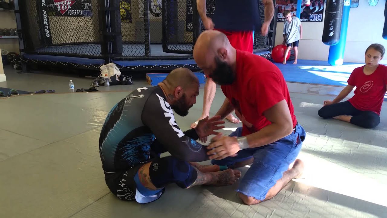 Arm drag to back half hook