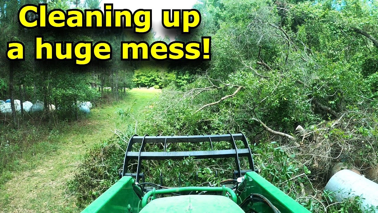 Cleaning up a huge mess! John Deere 4066R and a grapple make quick work! #760