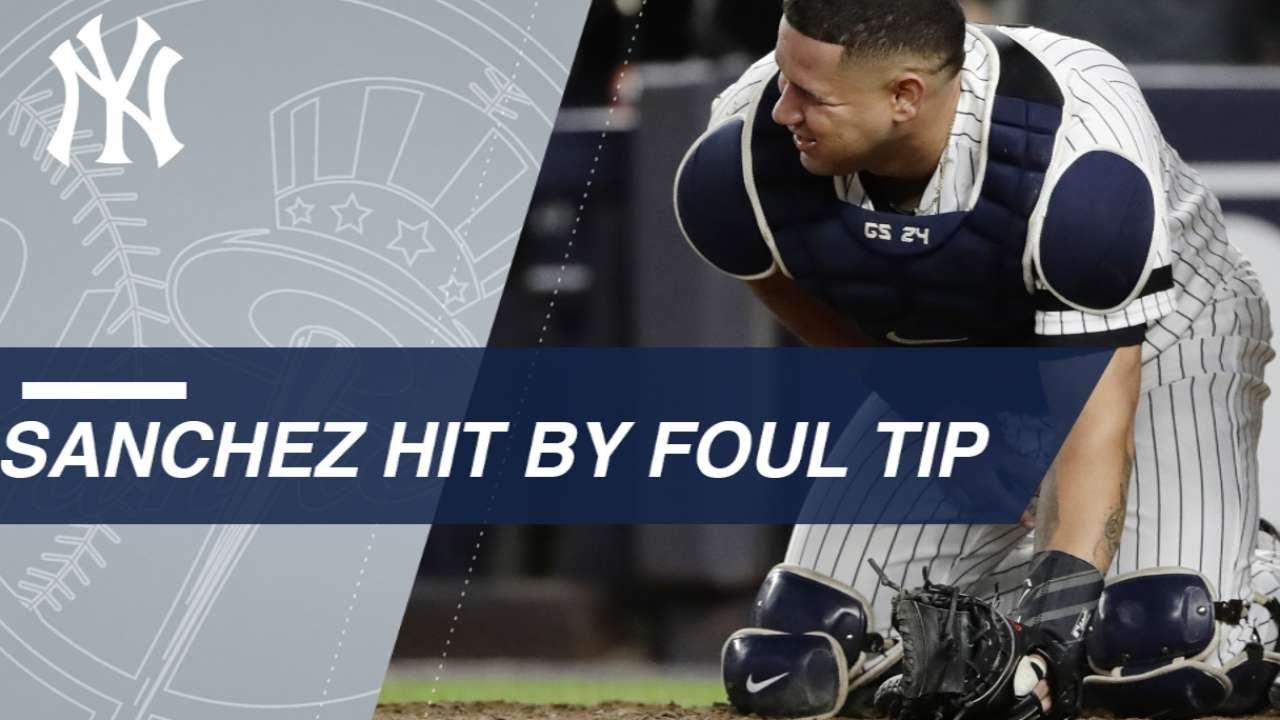 AL WC: Sanchez hit hard on foul tip, stays in game