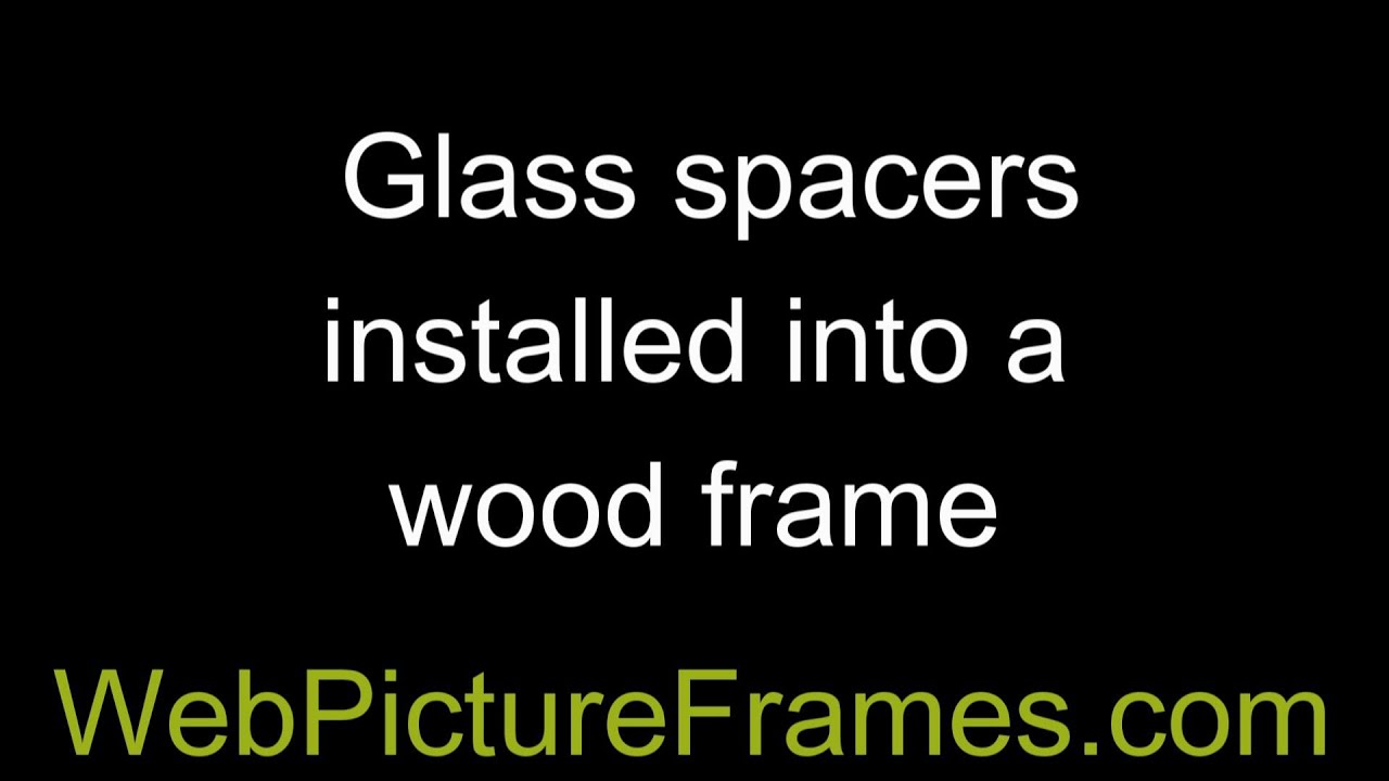 Glass spacers installed into a wood frame