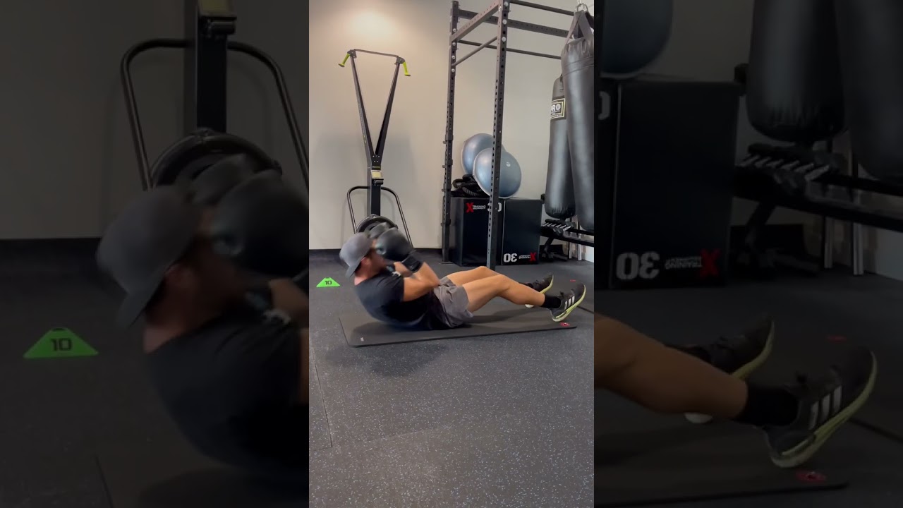 Sit up to 1-2 punch on heavy bag