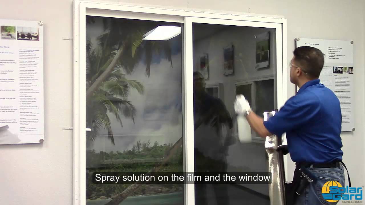 Drop Rolling Clear Dry Adhesive on flat glass