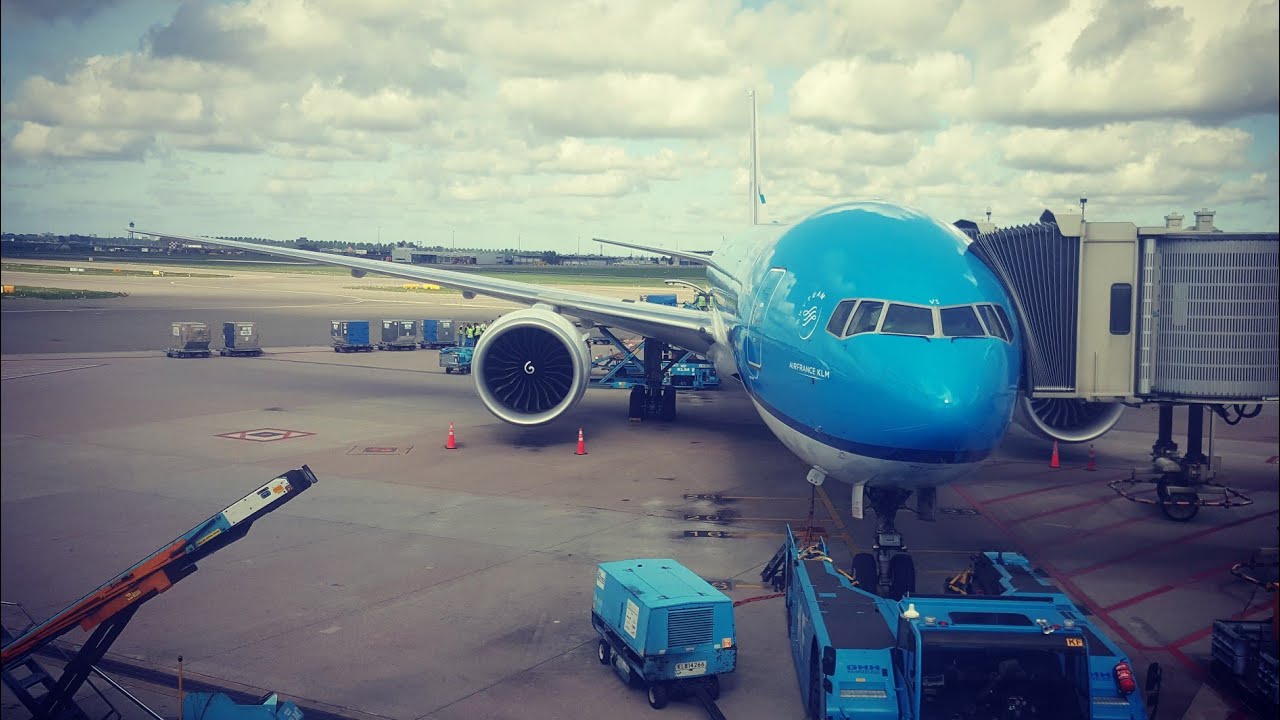 KLM Boeing 777-300ER pushback, engine start, safety demo, taxi and takeoff from Amsterdam